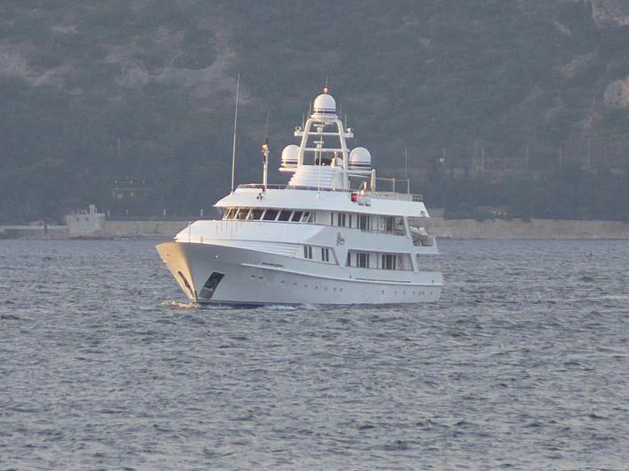 a white boat in the water aboard VIXIT Yacht for Sale