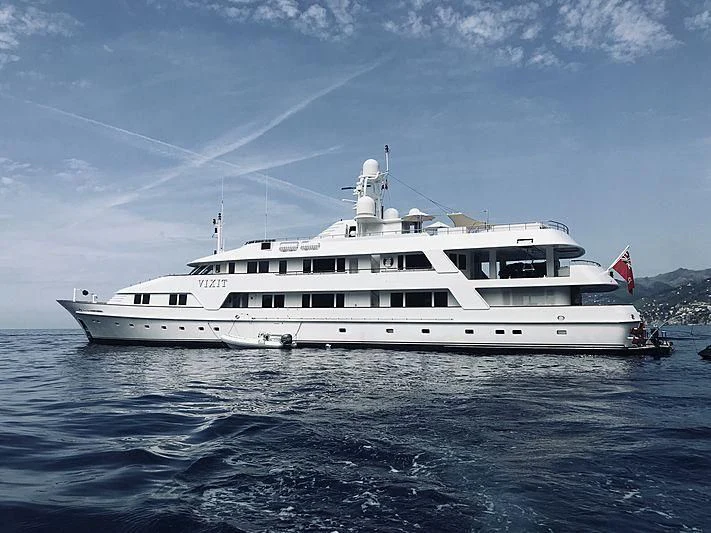 a white yacht in the water aboard VIXIT Yacht for Sale