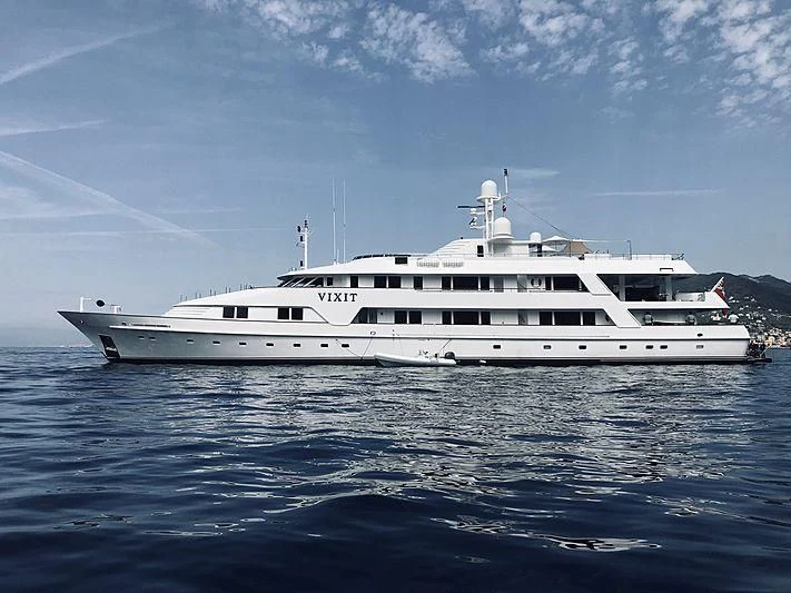 a white yacht in the water aboard VIXIT Yacht for Sale