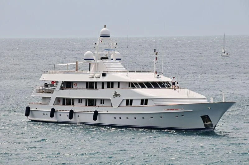 a large white boat in the water aboard VIXIT Yacht for Sale