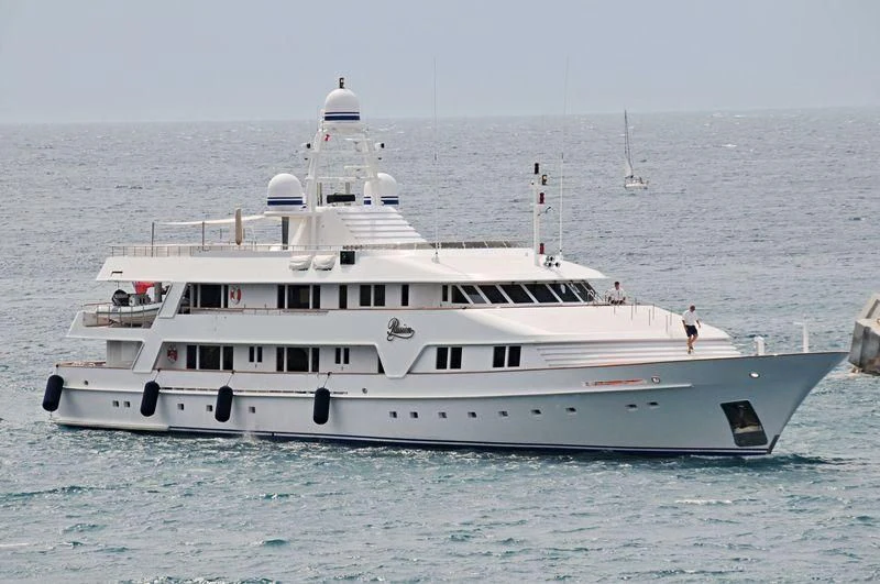 a white yacht in the water aboard VIXIT Yacht for Sale