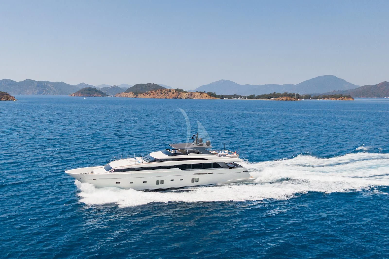 a white boat on the water aboard MORNING STAR Yacht for Charter