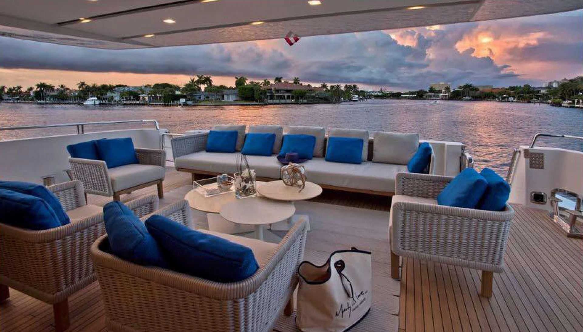 a lounge area with a large patio and a large pool aboard MORNING STAR Yacht for Charter