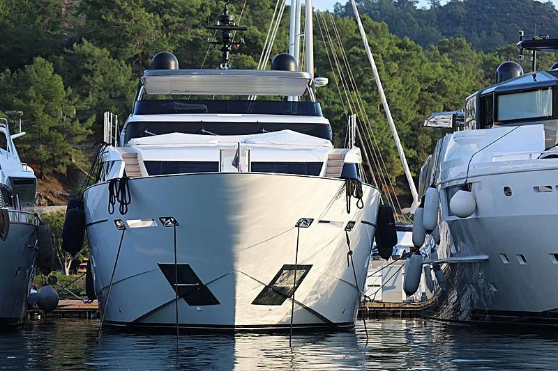 a group of boats are parked in a harbor aboard MORNING STAR Yacht for Charter