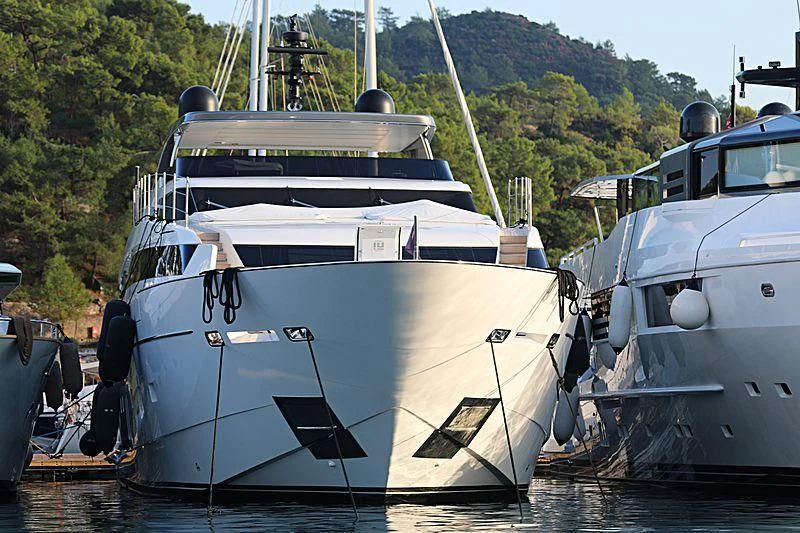 a couple of boats are parked in a harbor aboard MORNING STAR Yacht for Charter