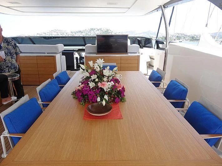 a table with flowers on it aboard MORNING STAR Yacht for Charter
