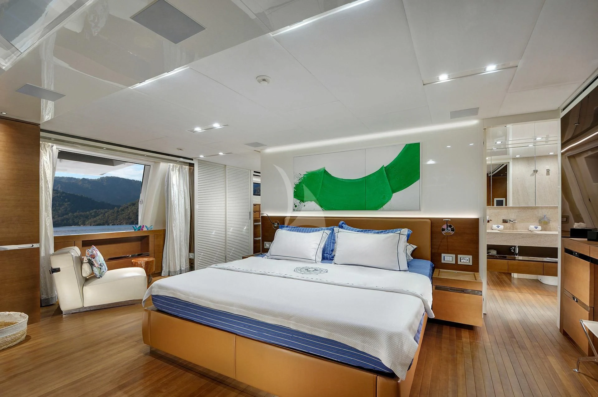 a bedroom with a large bed aboard MORNING STAR Yacht for Charter