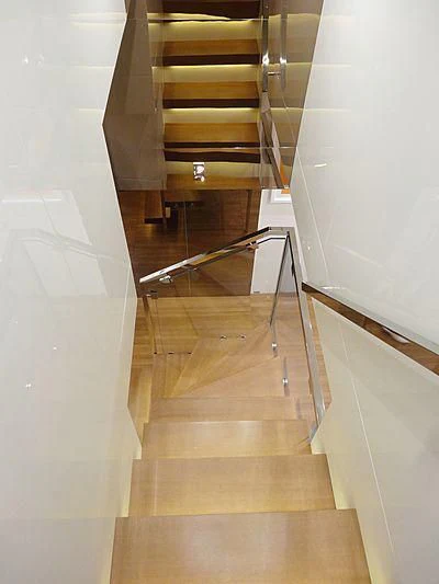 a staircase with a railing aboard MORNING STAR Yacht for Charter