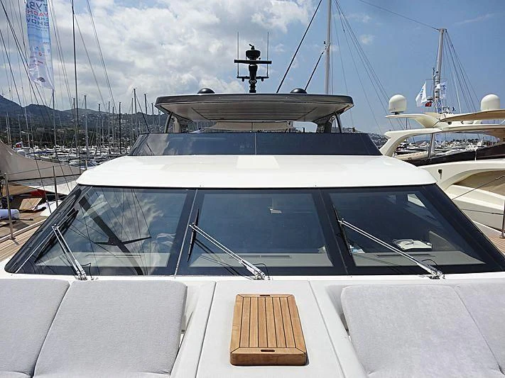 a white car with a white roof and a black cross on top aboard MORNING STAR Yacht for Charter