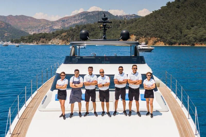 a group of people on a boat aboard MORNING STAR Yacht for Charter