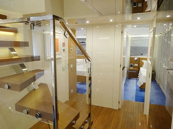 a room with a large mirror aboard MORNING STAR Yacht for Charter