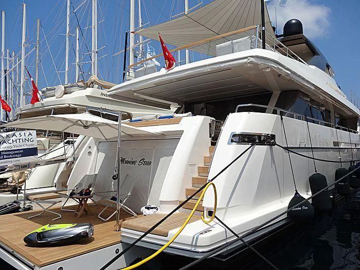 a large white boat aboard MORNING STAR Yacht for Charter