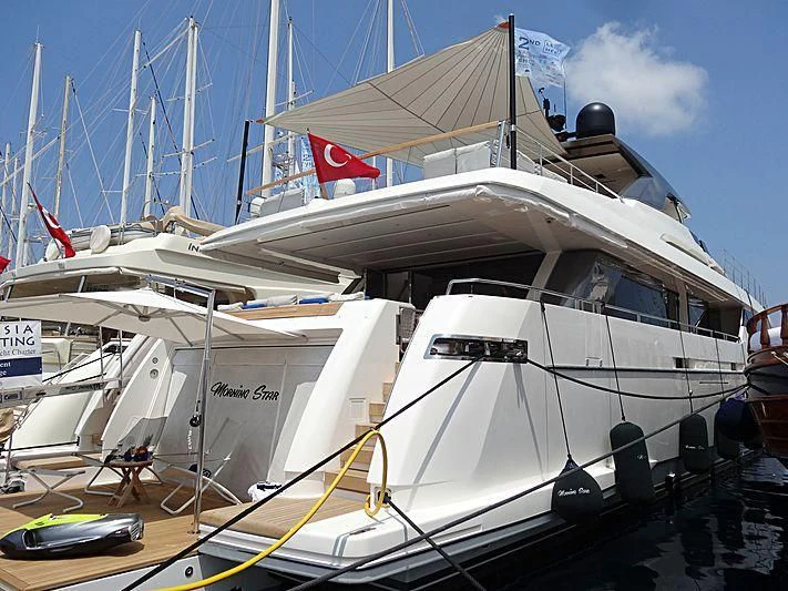 a boat docked at a pier aboard MORNING STAR Yacht for Charter