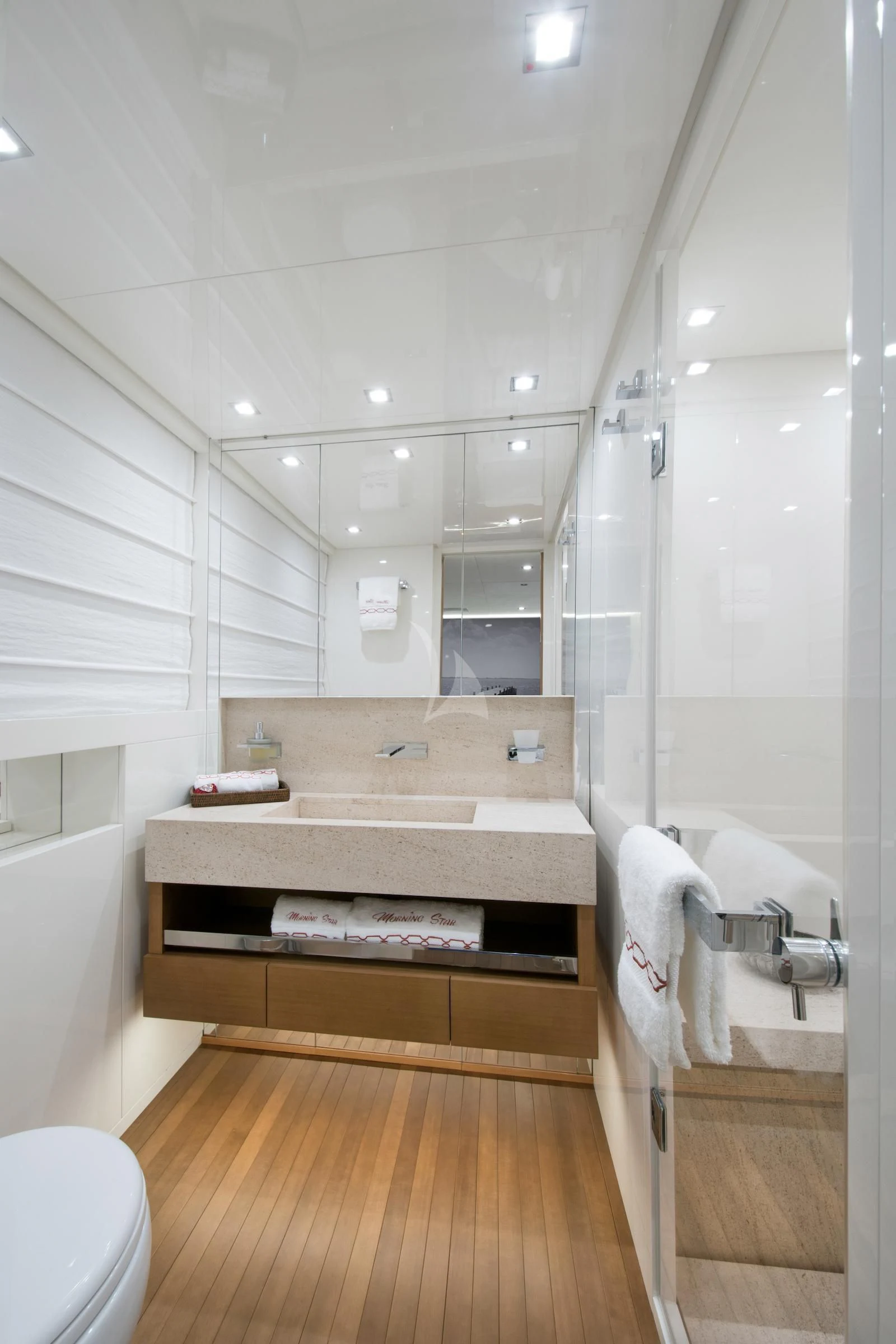 a bathroom with a sink and a toilet aboard MORNING STAR Yacht for Charter