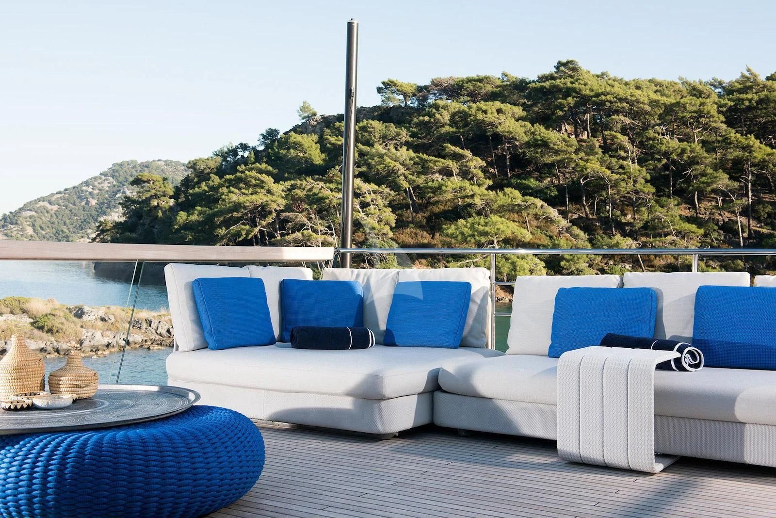 a white couch on a deck aboard MORNING STAR Yacht for Charter