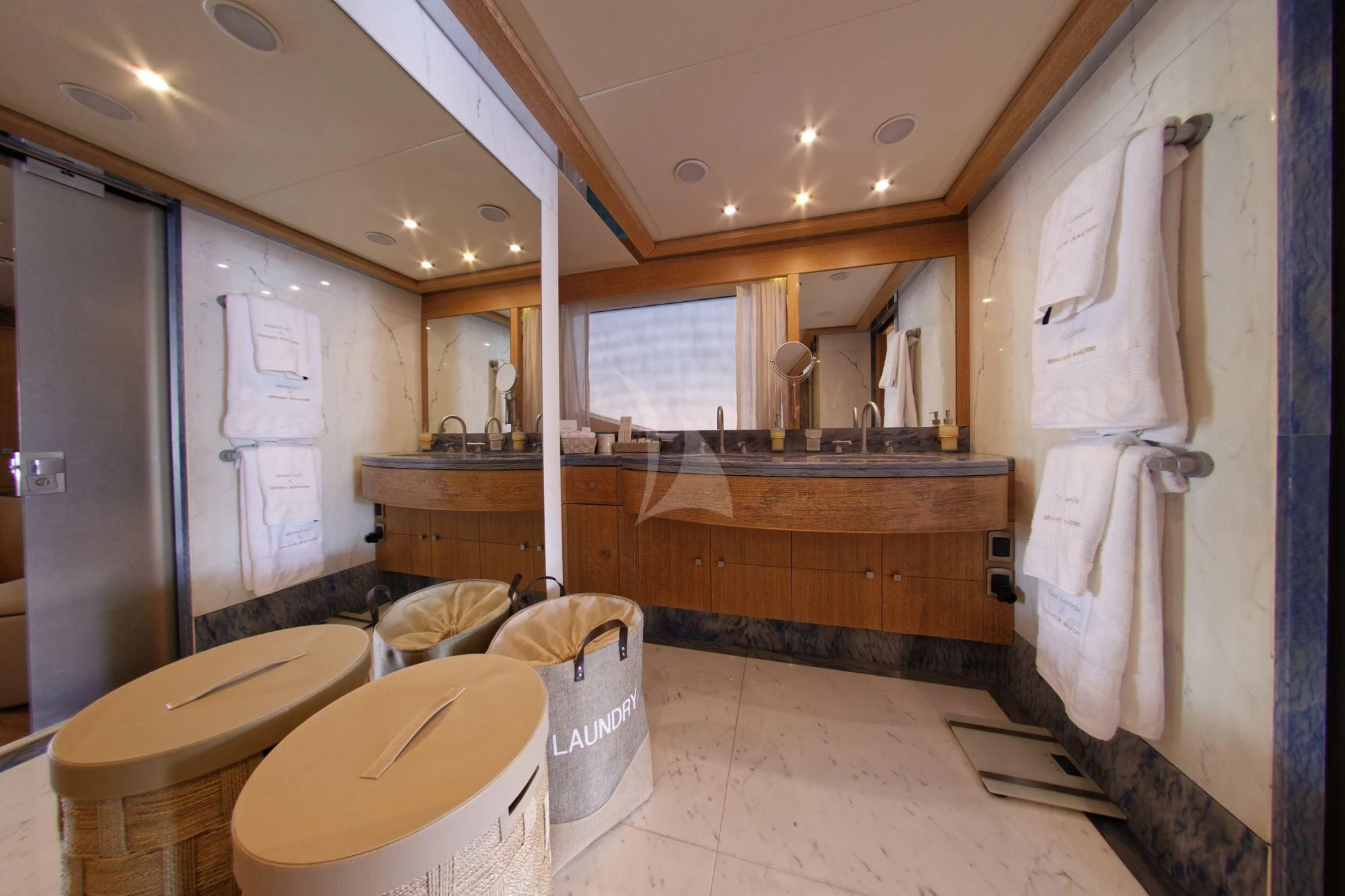 a bathroom with a toilet and sink aboard GRANDE AMORE Yacht for Charter
