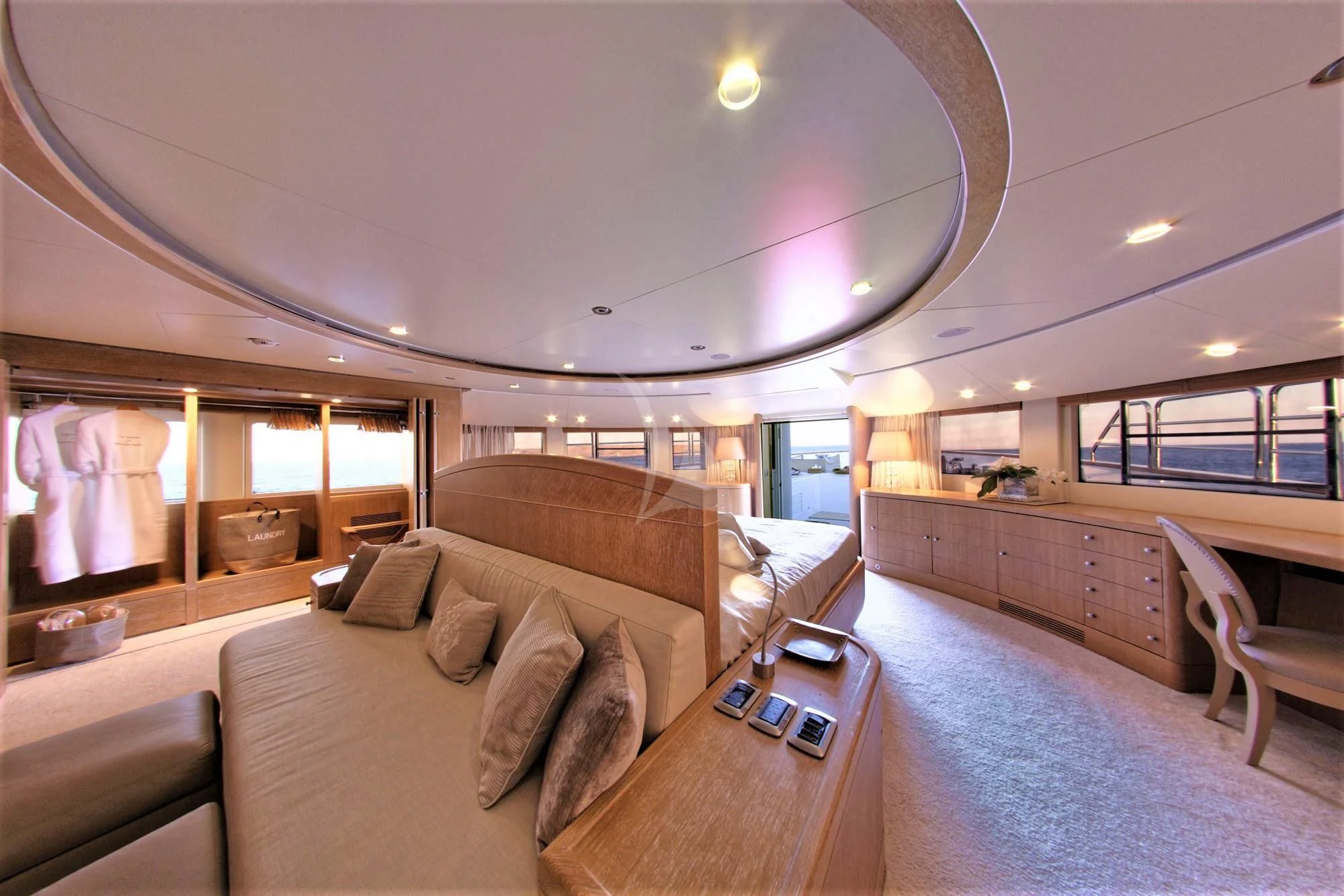 a living room with a couch and a table aboard GRANDE AMORE Yacht for Charter