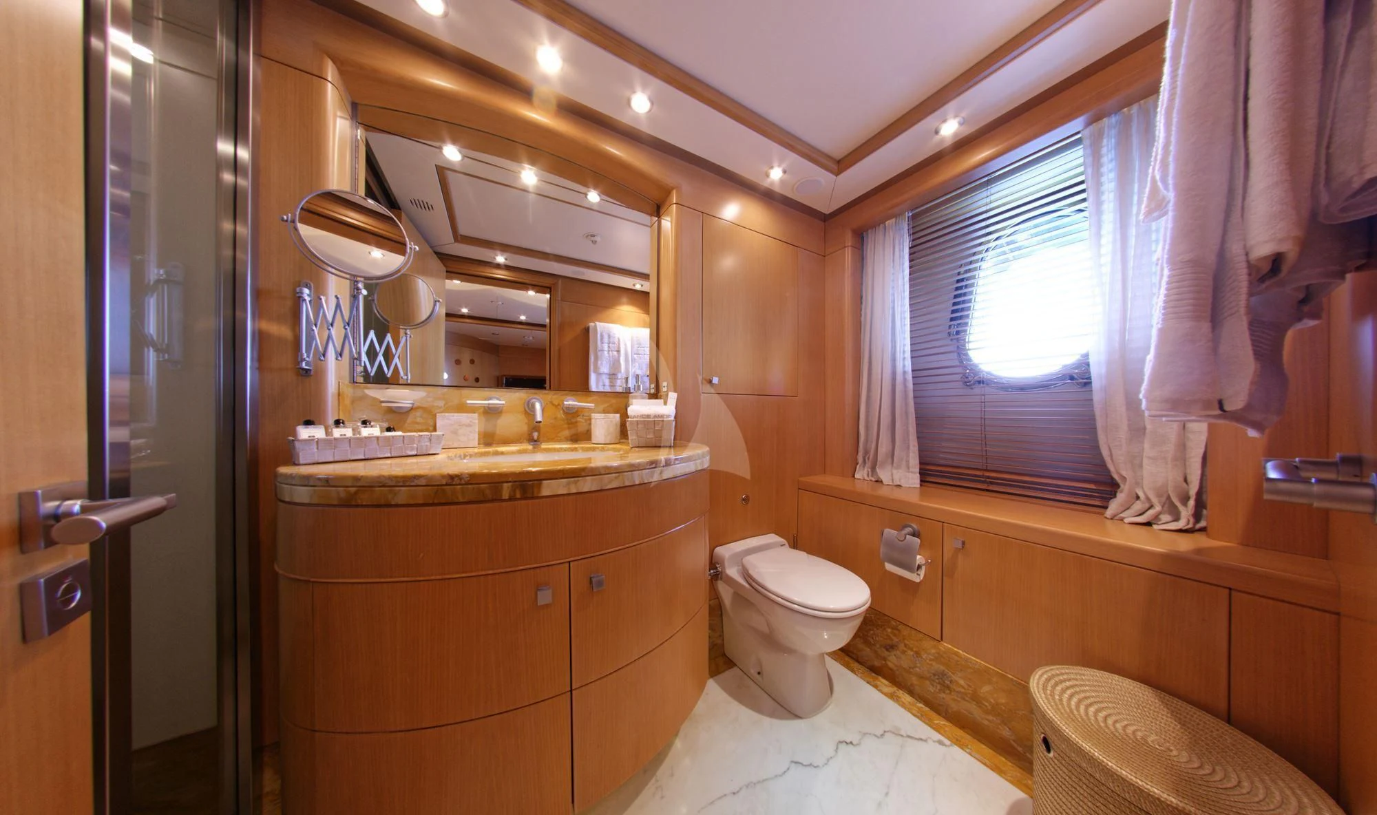 a bathroom with a toilet and a sink aboard GRANDE AMORE Yacht for Charter