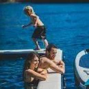 a person jumping into the water aboard GRANDE AMORE Yacht for Charter