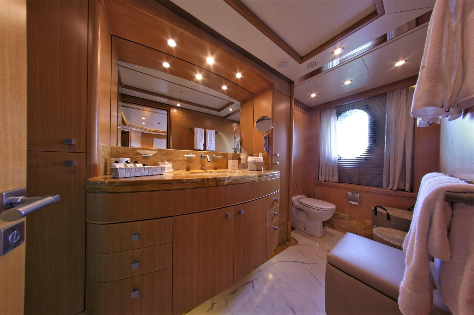 a bathroom with a sink and a mirror aboard GRANDE AMORE Yacht for Charter