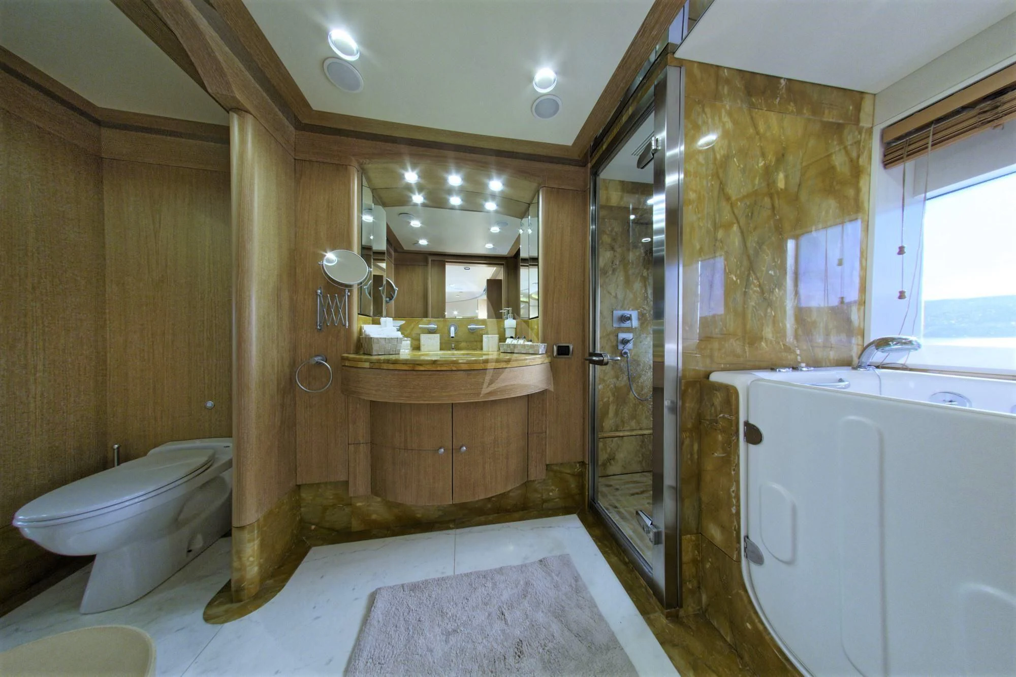a bathroom with a sink and a toilet aboard GRANDE AMORE Yacht for Charter
