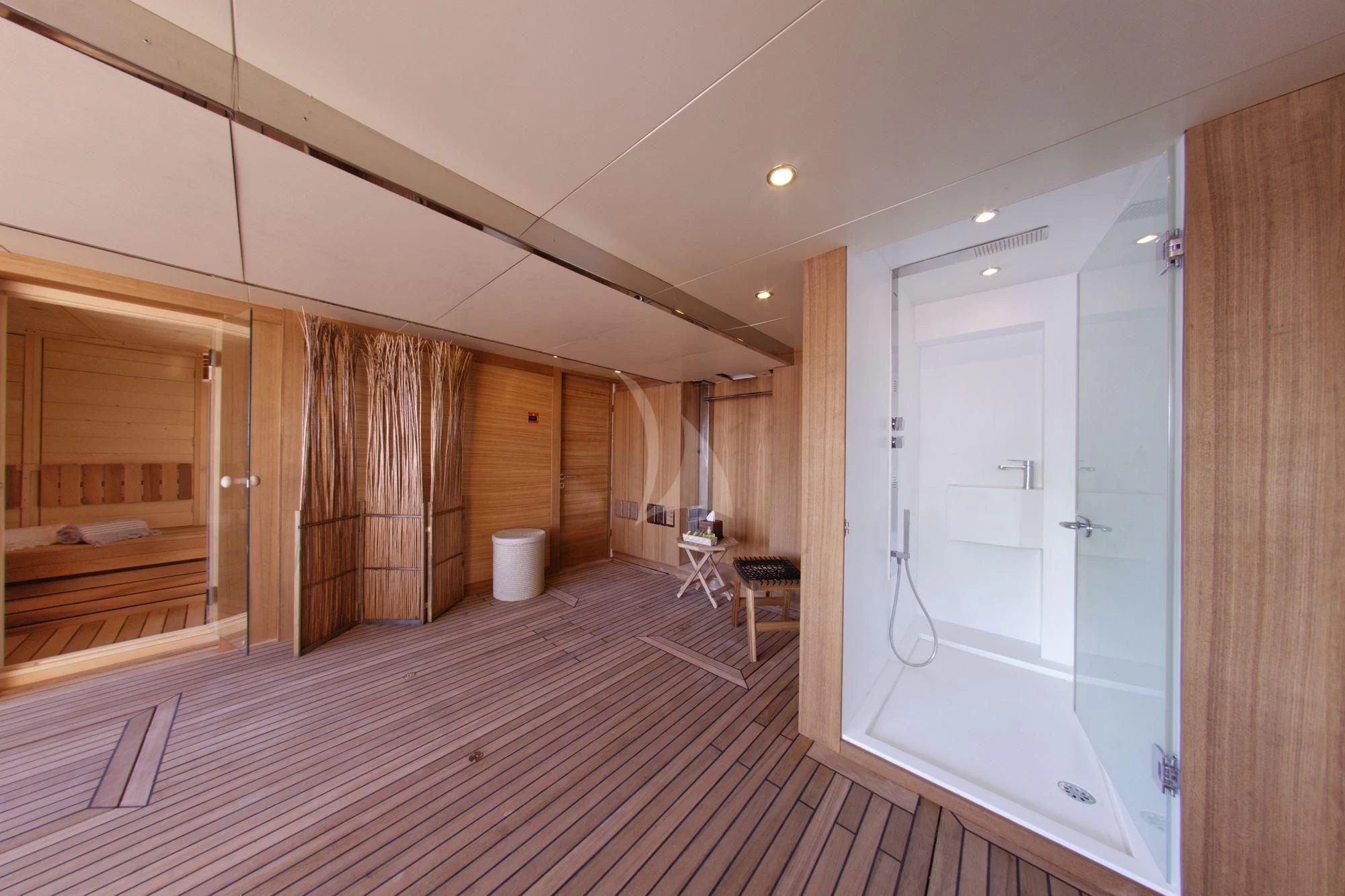 a room with a wood floor and a wood door aboard GRANDE AMORE Yacht for Charter