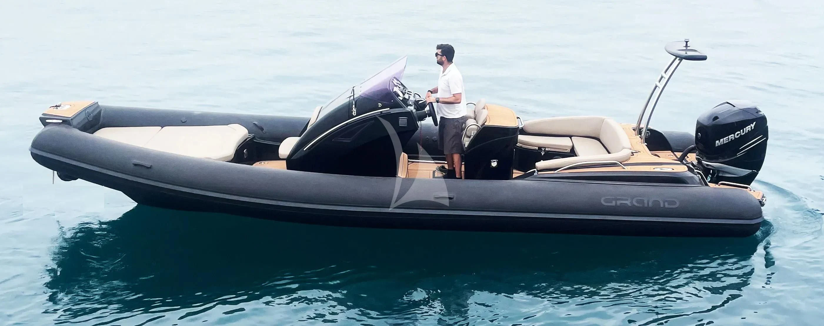 a person in a jet ski aboard GRANDE AMORE Yacht for Charter