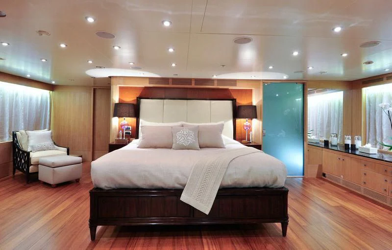a large bed in a room aboard GRANDE AMORE Yacht for Charter