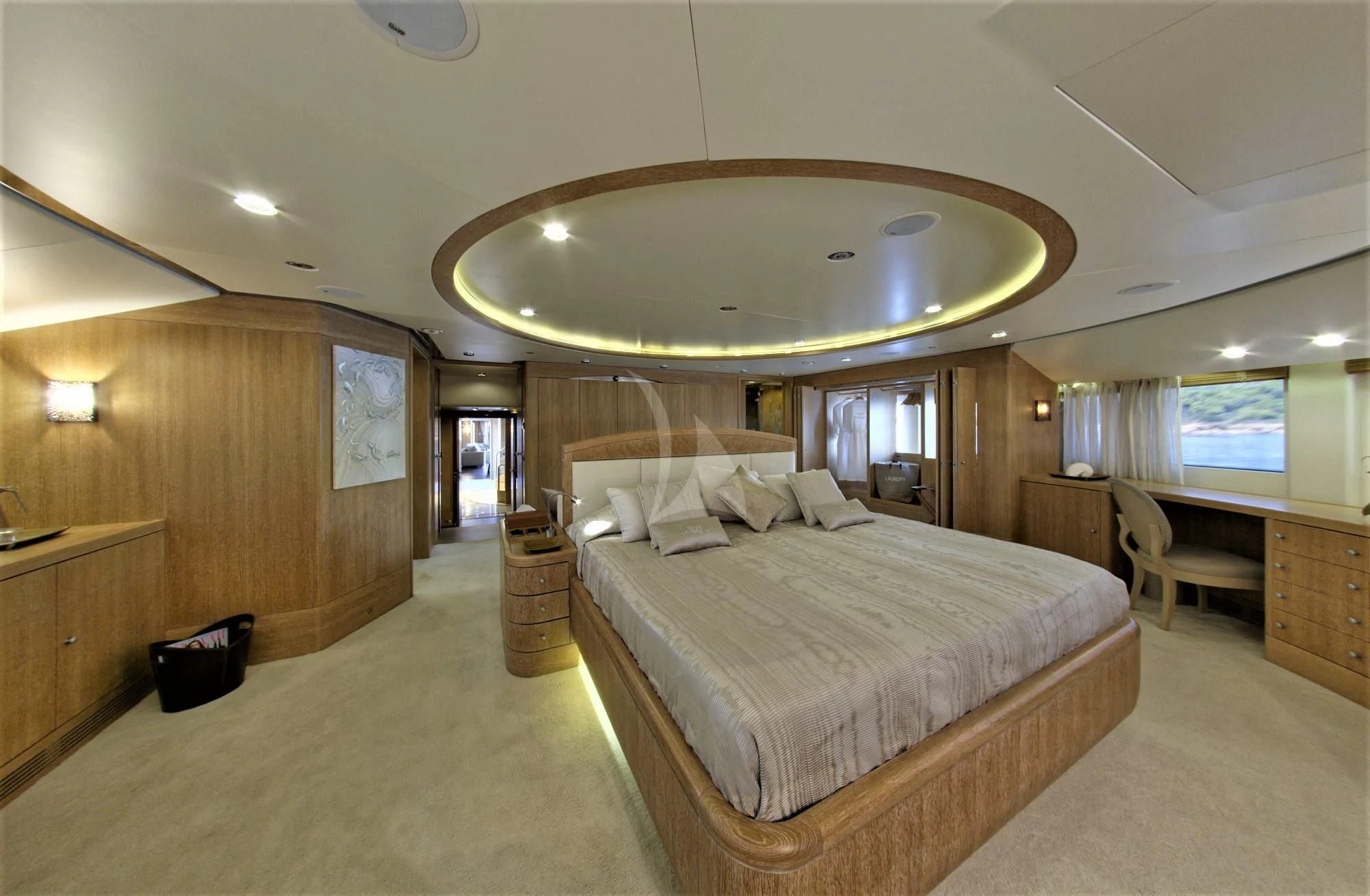 a large bedroom with a large bed aboard GRANDE AMORE Yacht for Charter