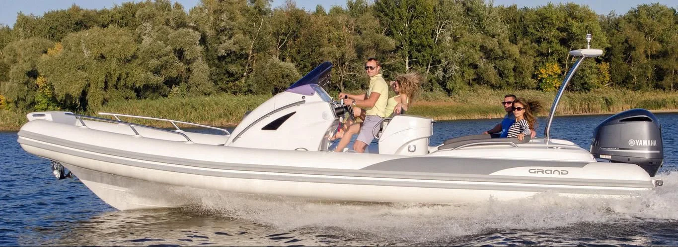 a group of people on a boat aboard GRANDE AMORE Yacht for Charter