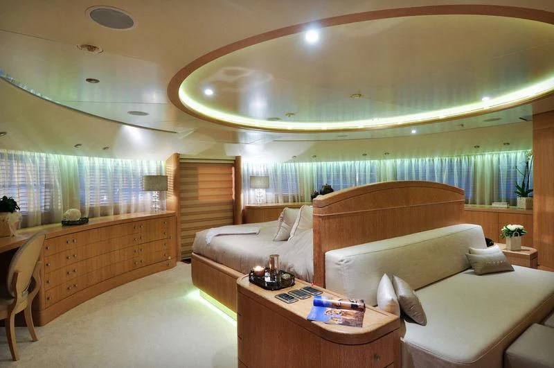 a living room with a large window aboard GRANDE AMORE Yacht for Charter