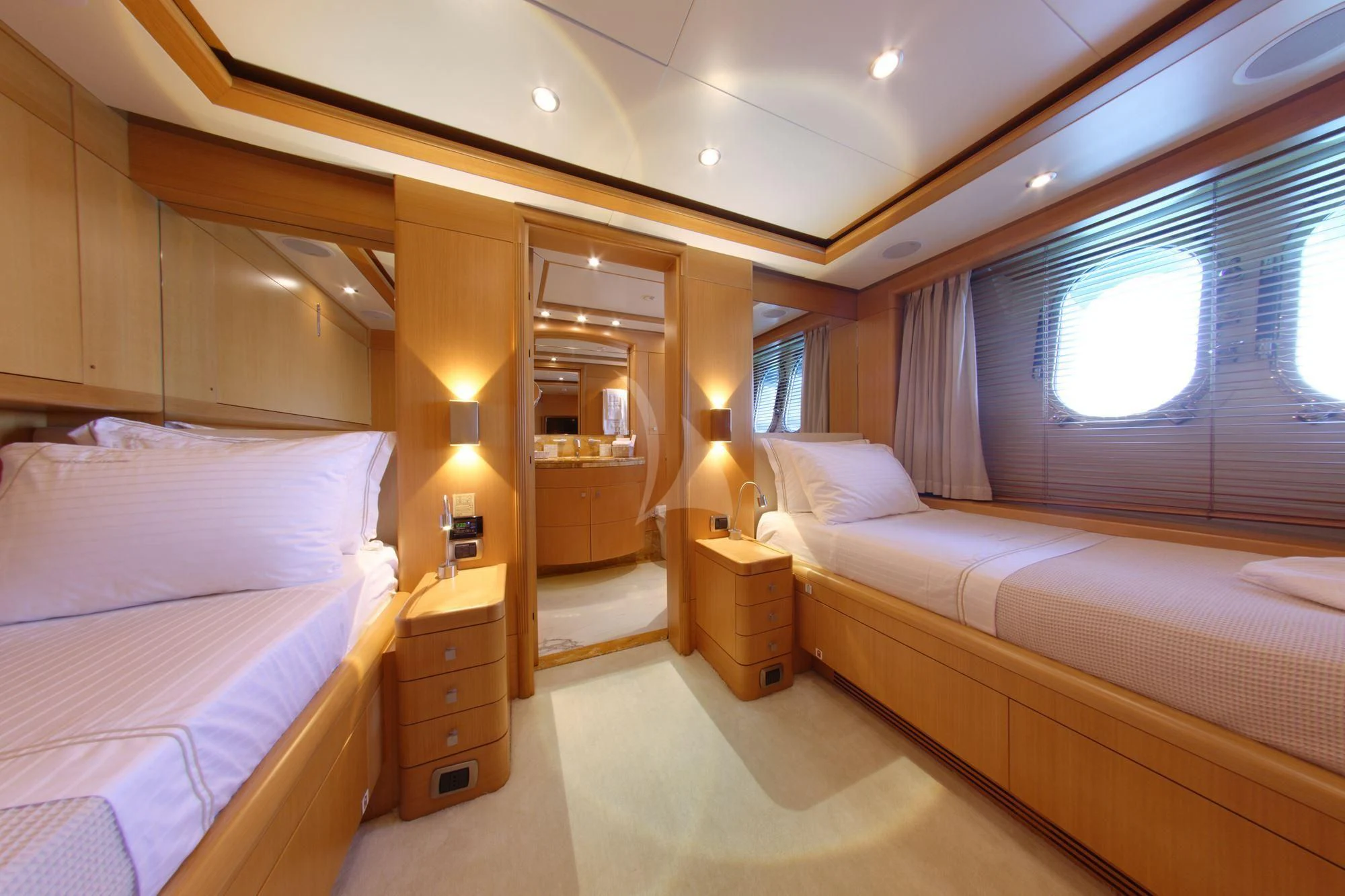 a room with two beds aboard GRANDE AMORE Yacht for Charter