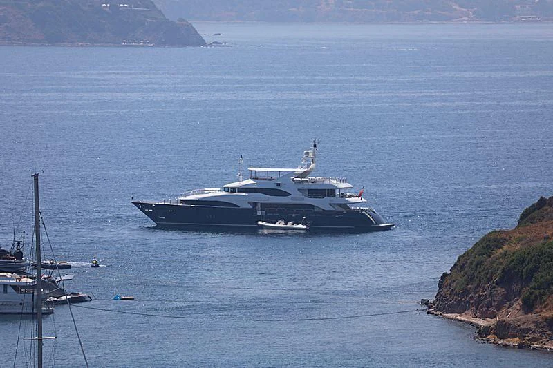 a large ship in the water aboard GRANDE AMORE Yacht for Charter