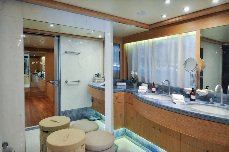 a bathroom with a large mirror aboard GRANDE AMORE Yacht for Charter