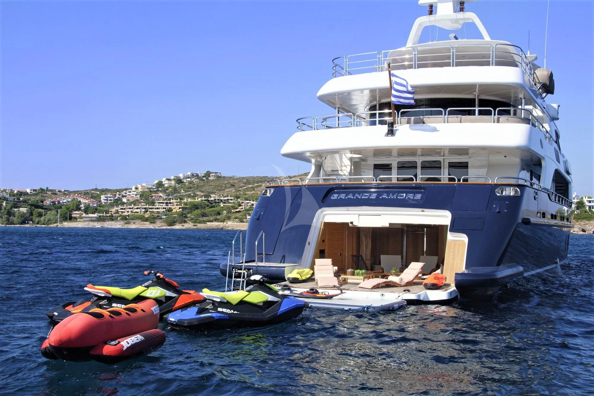 a boat docked at a pier aboard GRANDE AMORE Yacht for Charter