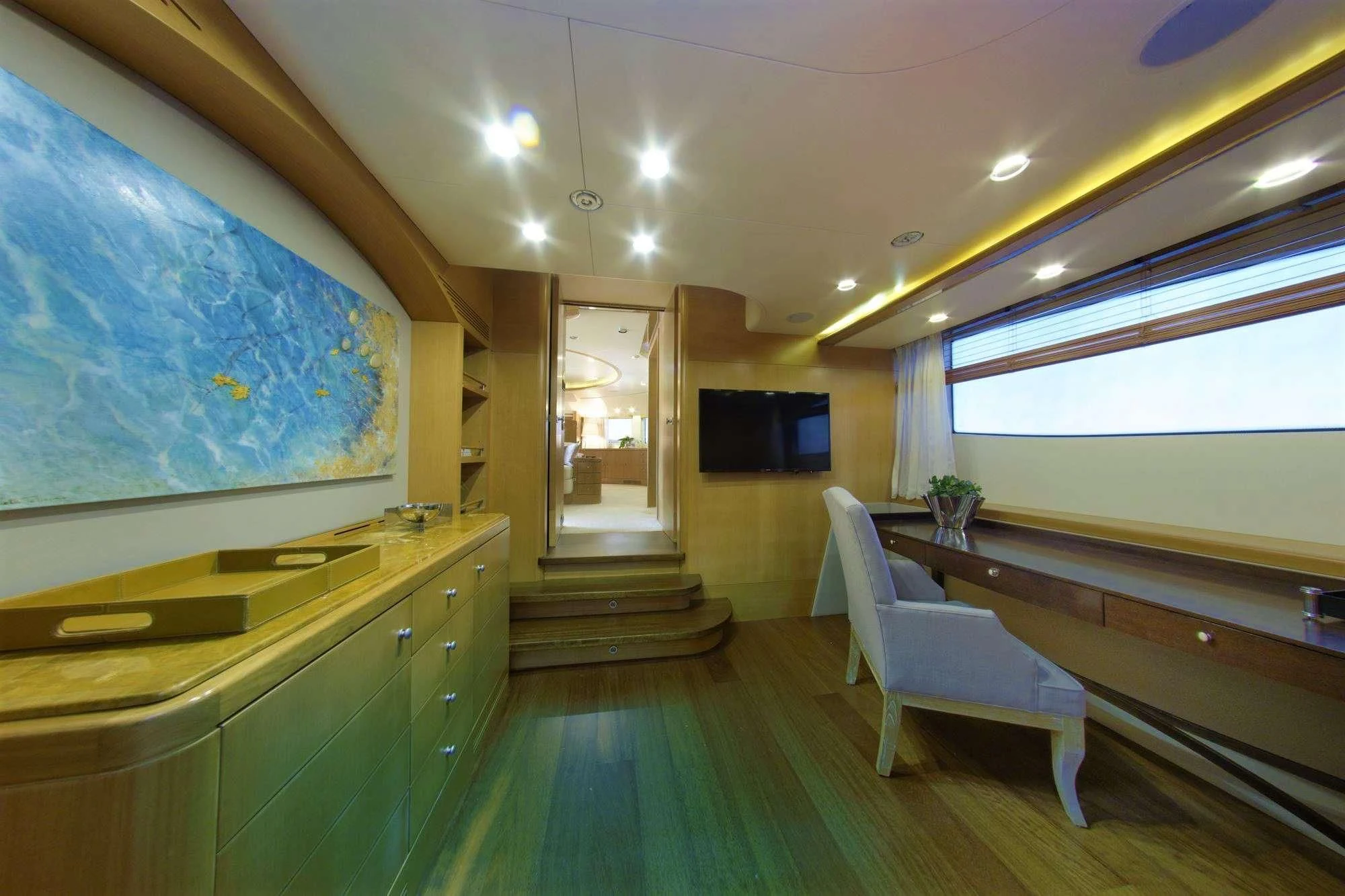 a room with a table and chairs aboard GRANDE AMORE Yacht for Charter