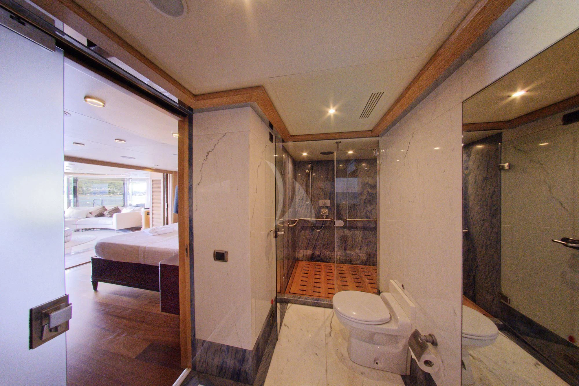 a bathroom with a glass shower aboard GRANDE AMORE Yacht for Charter