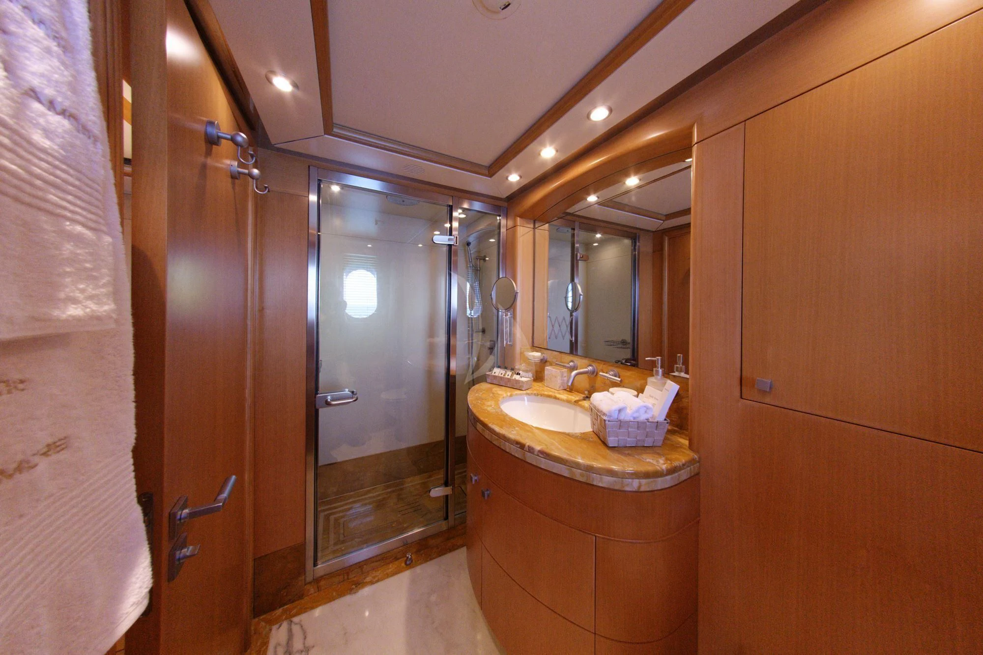 a bathroom with a sink and a shower aboard GRANDE AMORE Yacht for Charter