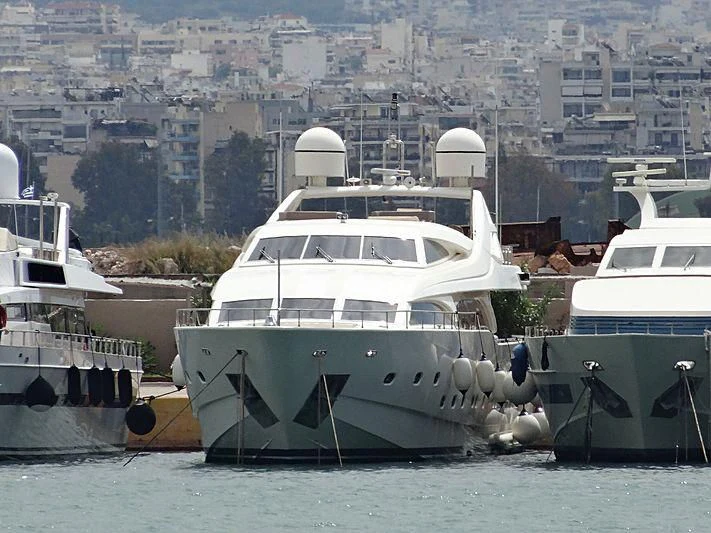 a group of boats in a harbor aboard WHISPER V Yacht for Sale
