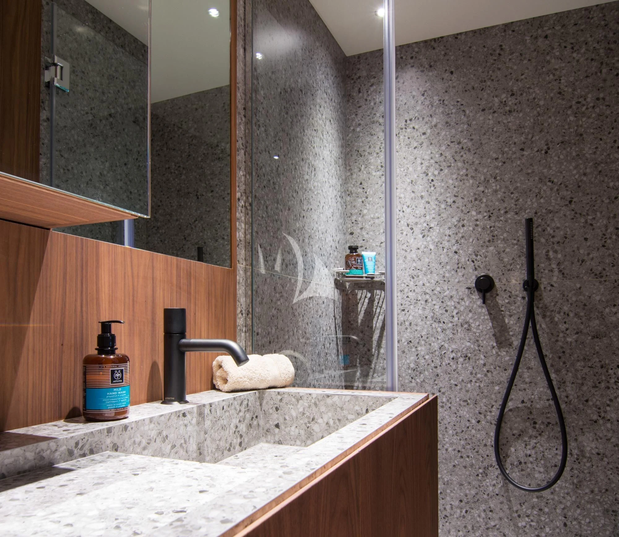 a bathroom with a sink and a shower aboard WHISPER V Yacht for Sale