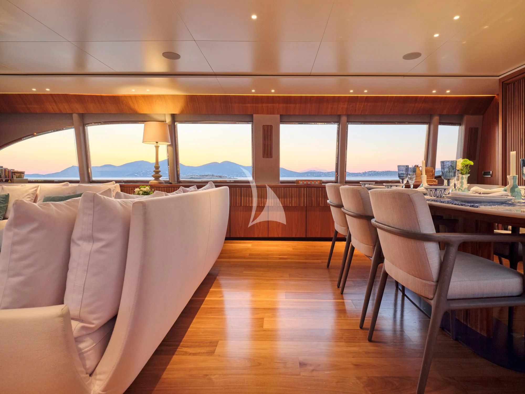 a room with a table and chairs aboard WHISPER V Yacht for Sale