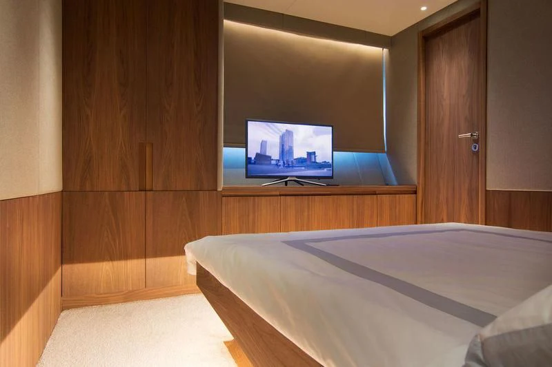 a bed in a room aboard WHISPER V Yacht for Sale