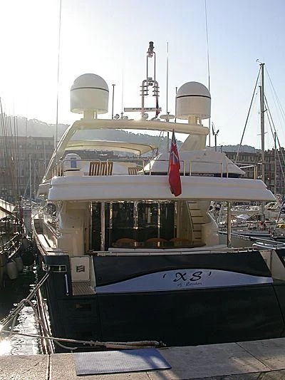 a boat with a red sail aboard WHISPER V Yacht for Sale