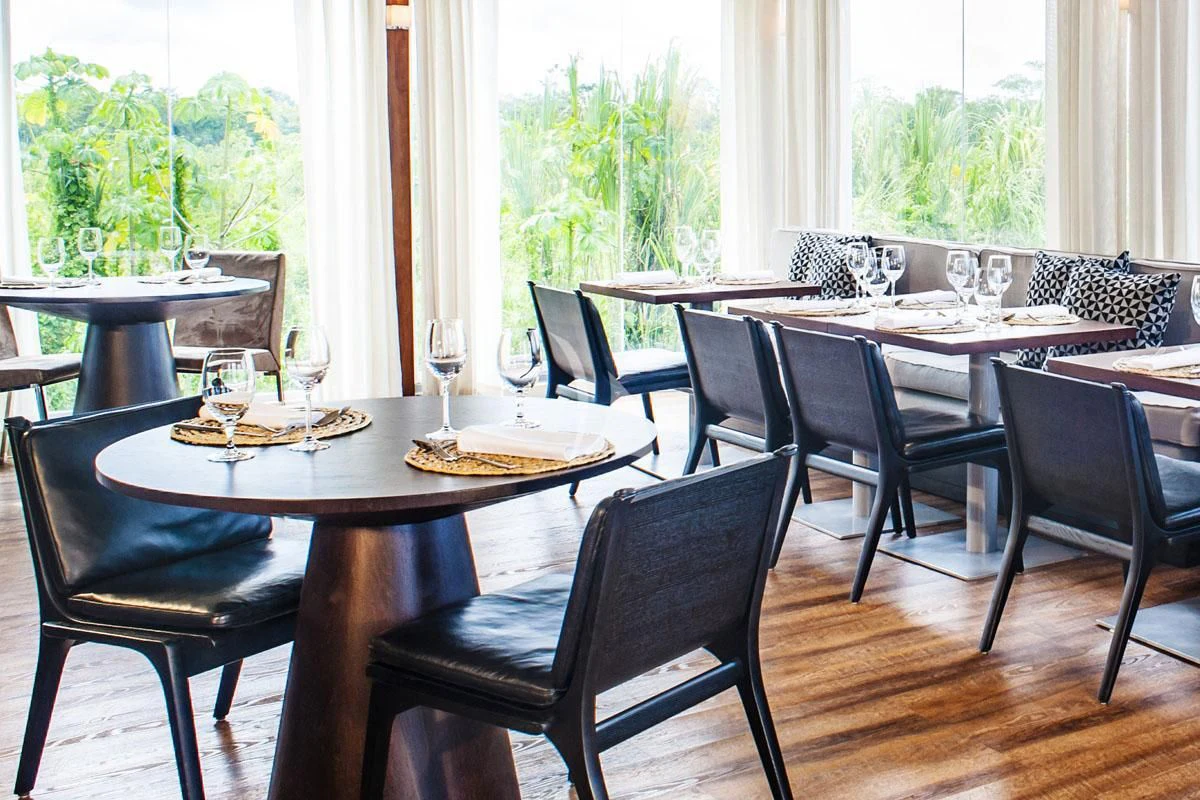 a table with chairs around it aboard ARIA AMAZON Yacht for Sale