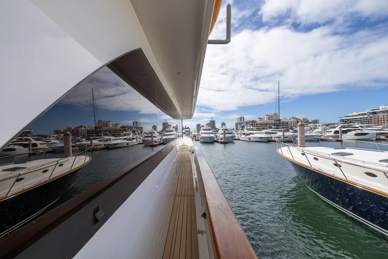 a boat is parked in a harbor aboard RELENTLESS Yacht for Sale