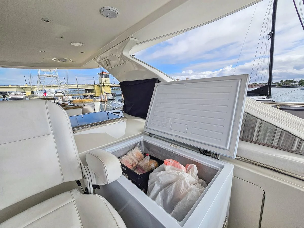 a person sitting in a car aboard RELENTLESS Yacht for Sale