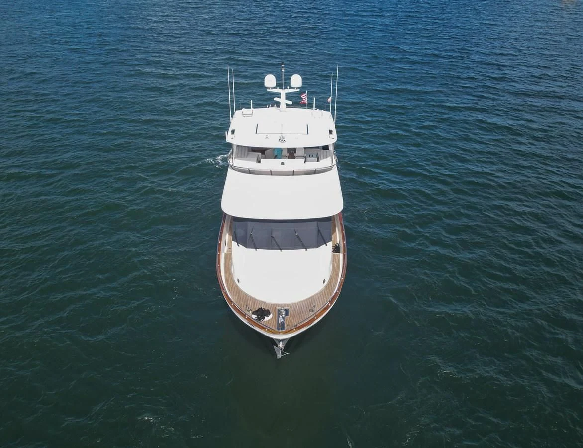 a white and black boat in the water aboard RELENTLESS Yacht for Sale
