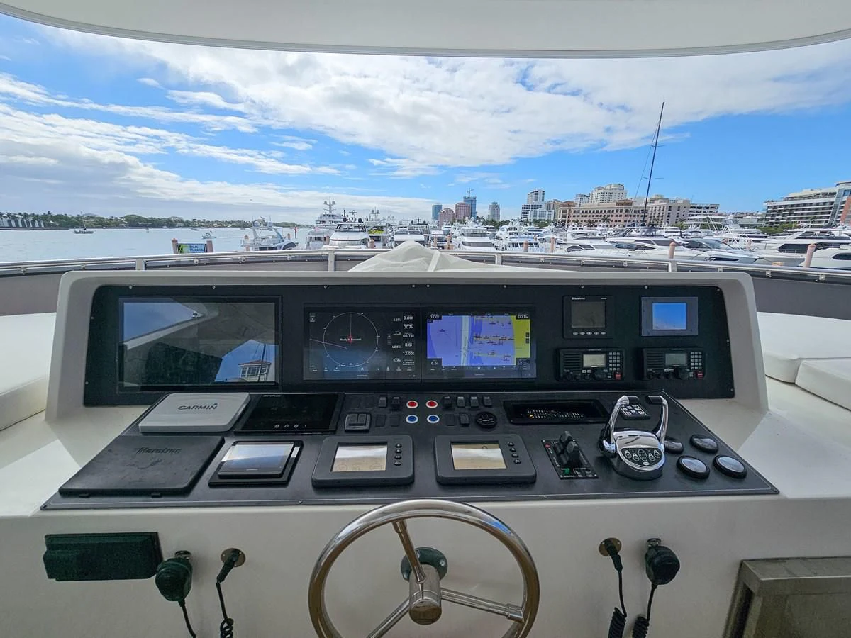 a control panel with a view of a city aboard RELENTLESS Yacht for Sale