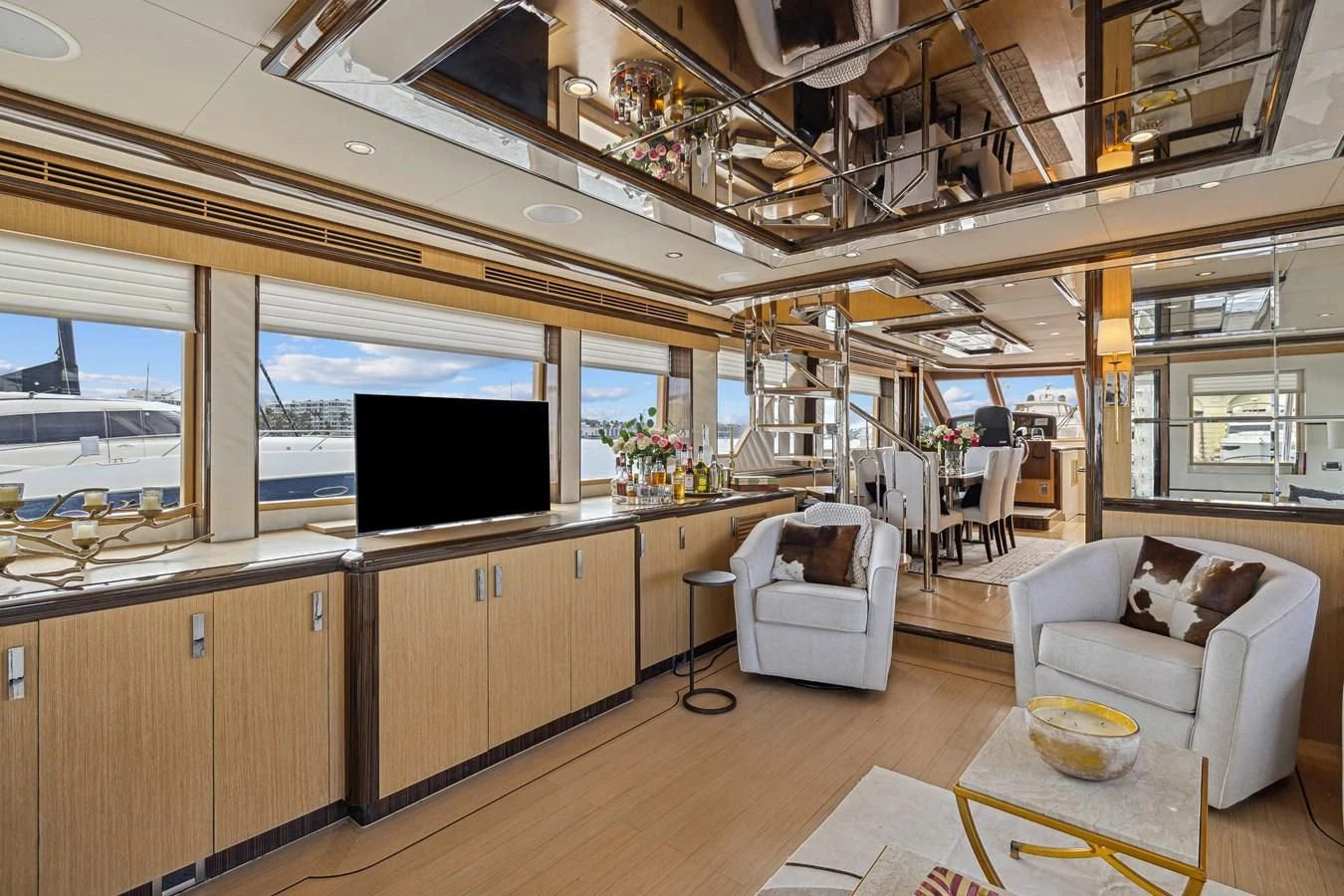 a room with a large window and a tv aboard RELENTLESS Yacht for Sale