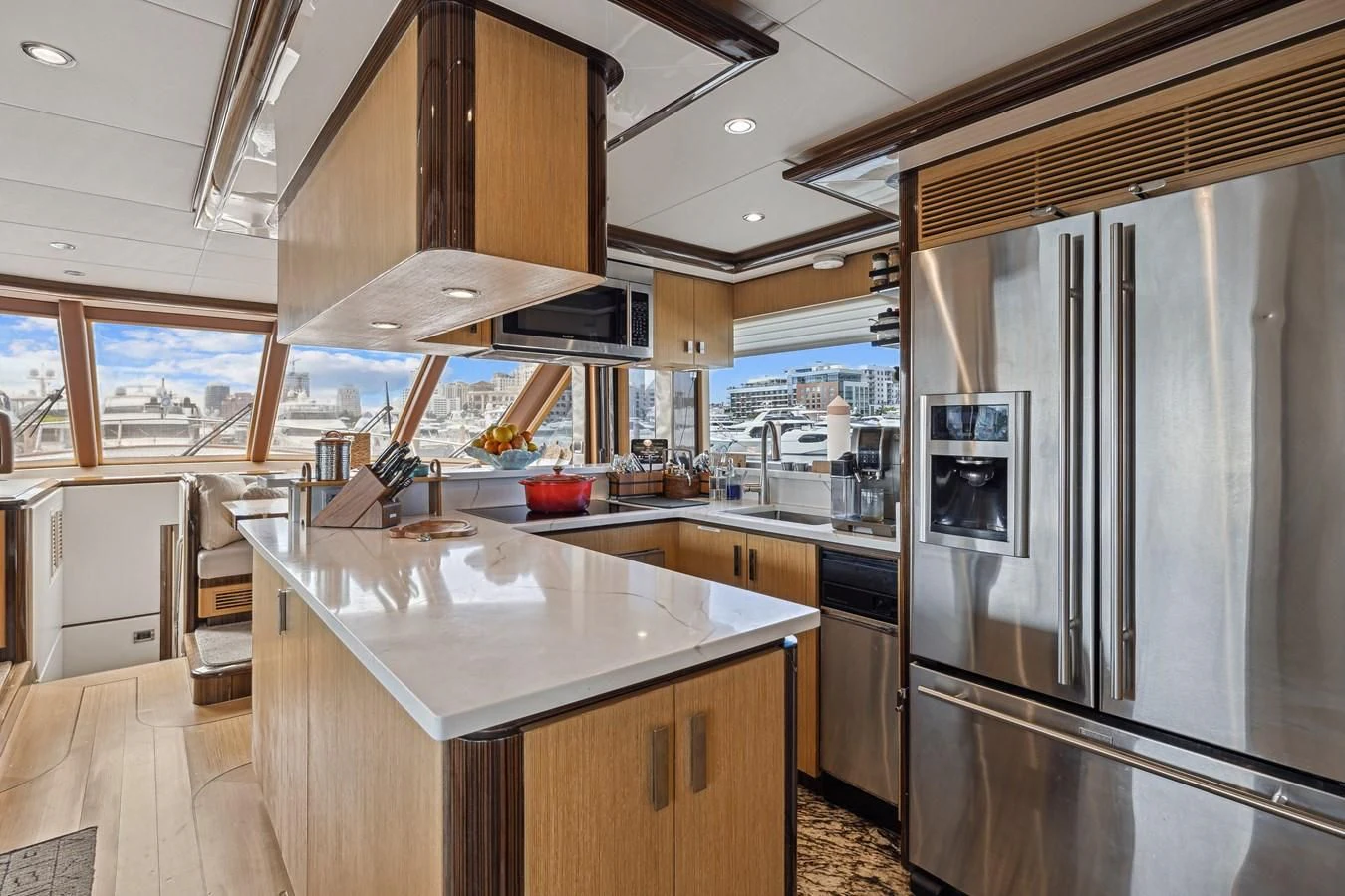 a kitchen with stainless steel appliances aboard RELENTLESS Yacht for Sale